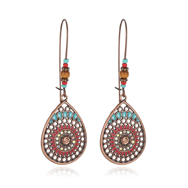 Boucles d'oreilles pendantes au style palatial - e-thnic