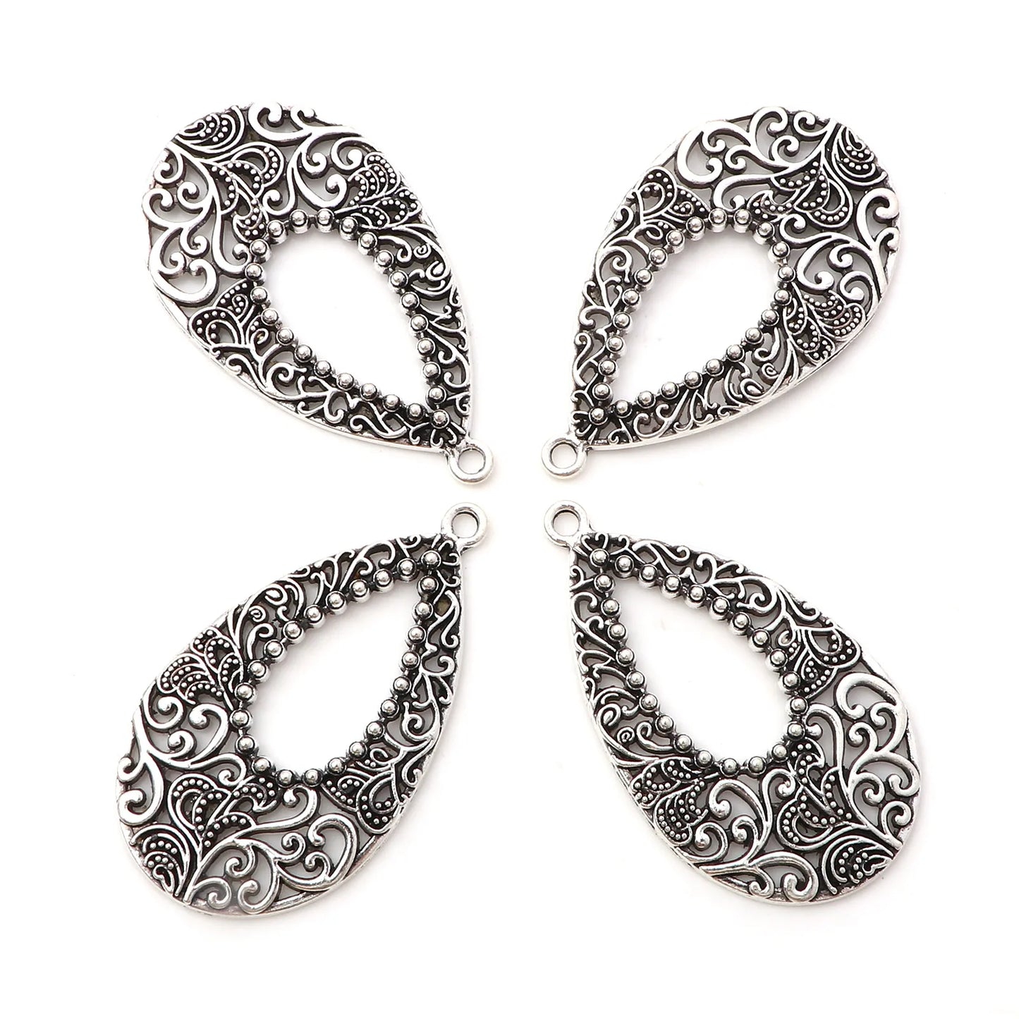 Pendentifs vintage ajourés en métal couleur argent - e-thnic