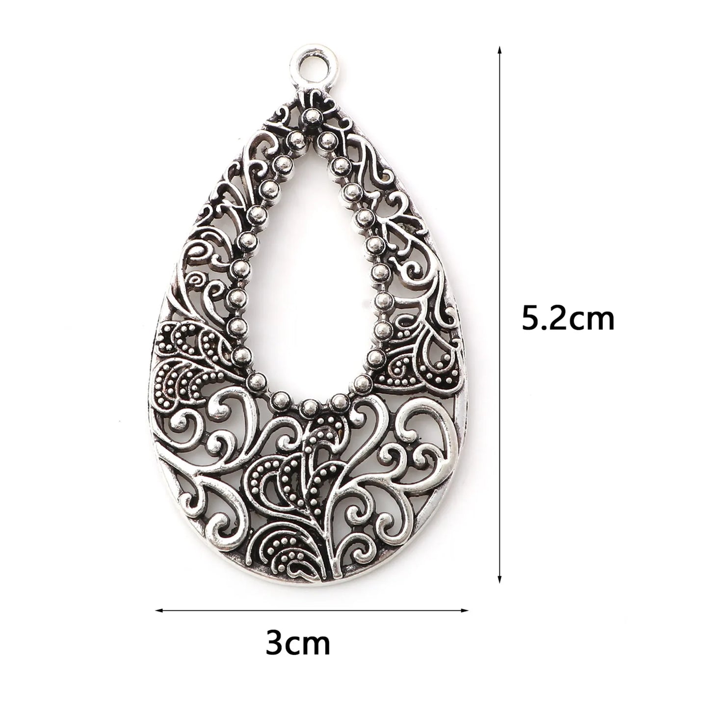 Pendentifs vintage ajourés en métal couleur argent - e-thnic