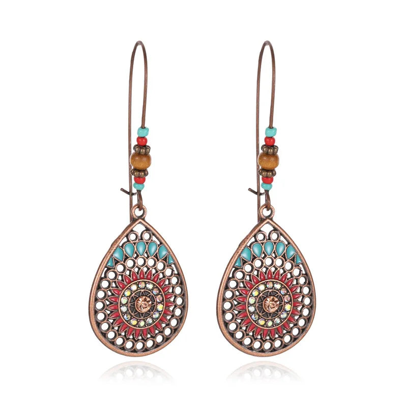 Boucles d'oreilles pendantes au style palatial - e-thnic