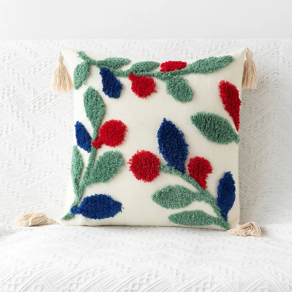 Housse de coussin avec broderie géométrique ornée de pompons - e-thnic