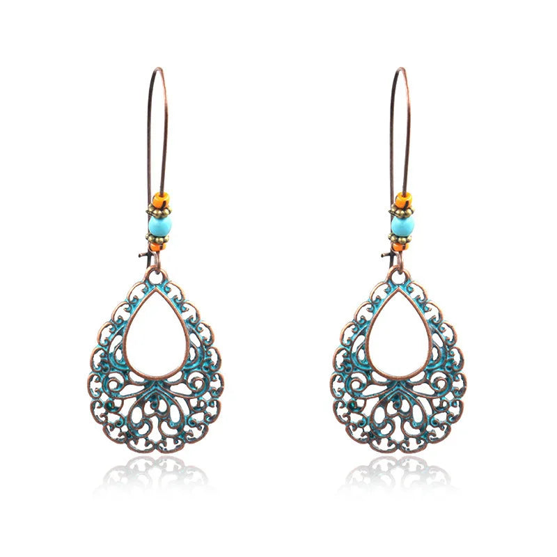 Boucles d'oreilles pendantes au style palatial - e-thnic