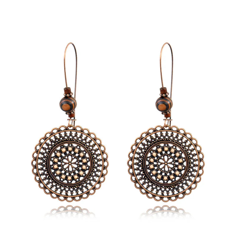 Boucles d'oreilles pendantes au style palatial - e-thnic